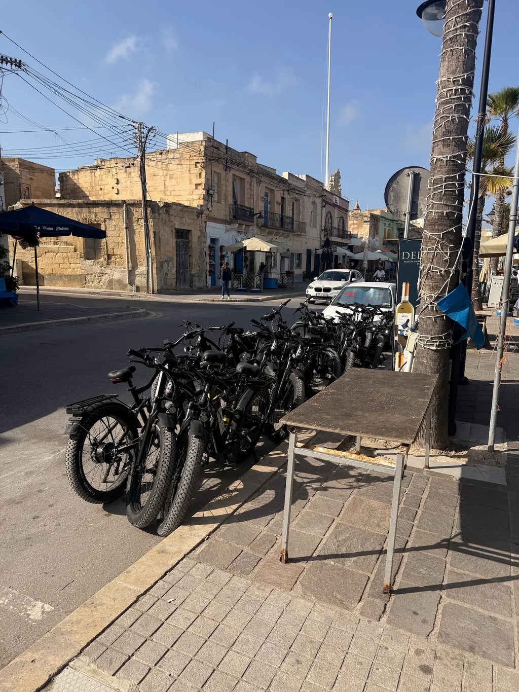 Los Arditos e-bikes lined up on a street in Malta