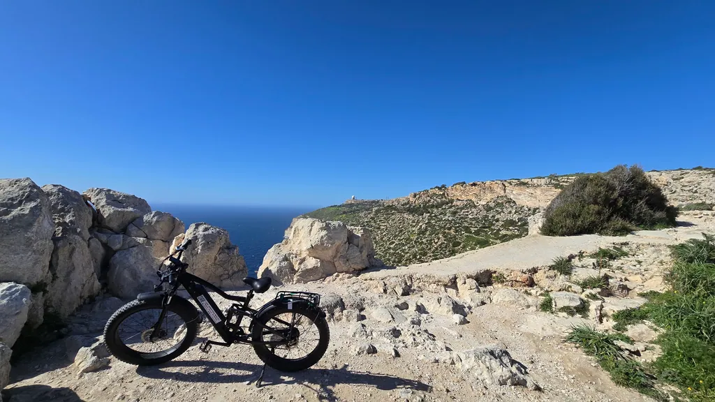 E-bike on the rocky south coast of Malta near the Blue Grotto